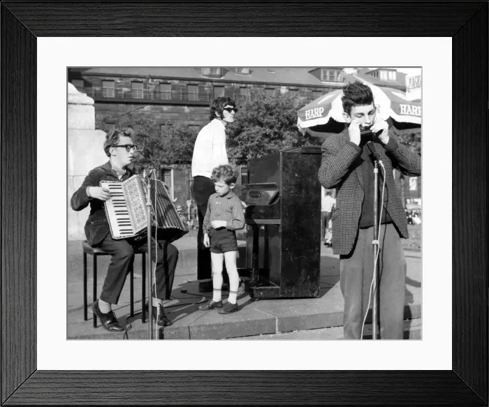 Framed Print : North East Festivals Crowds are treated to a musical treat by an amateur trio Framed Print : North East Festivals Crowds are treated to a musical treat by an amateur trio