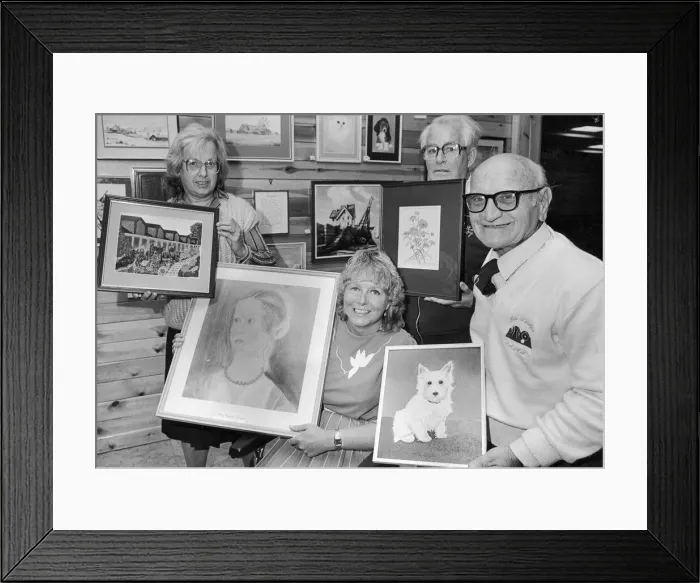 Framed Print : Showing their paintings are some of the contributors to an art exhibition Framed Print : Showing their paintings are some of the contributors to an art exhibition