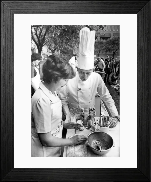 Framed Print : North East Festivals A cook takes some tips from a chef in the cook-o-ton in Old Framed Print : North East Festivals A cook takes some tips from a chef in the cook-o-ton in Old