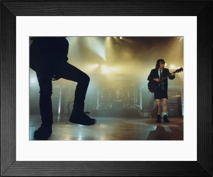 Framed Print : Rock group AC / DC live in concert at the Newcastle Arena 5 June 1996 Framed Print : Rock group AC / DC live in concert at the Newcastle Arena 5 June 1996