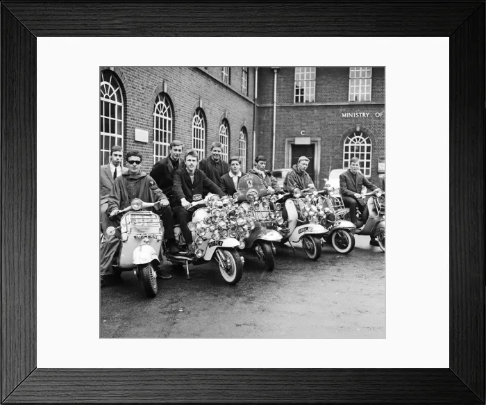 Framed Print : Mods wearing suits and parkas on Motor Scooters covered with extra lights