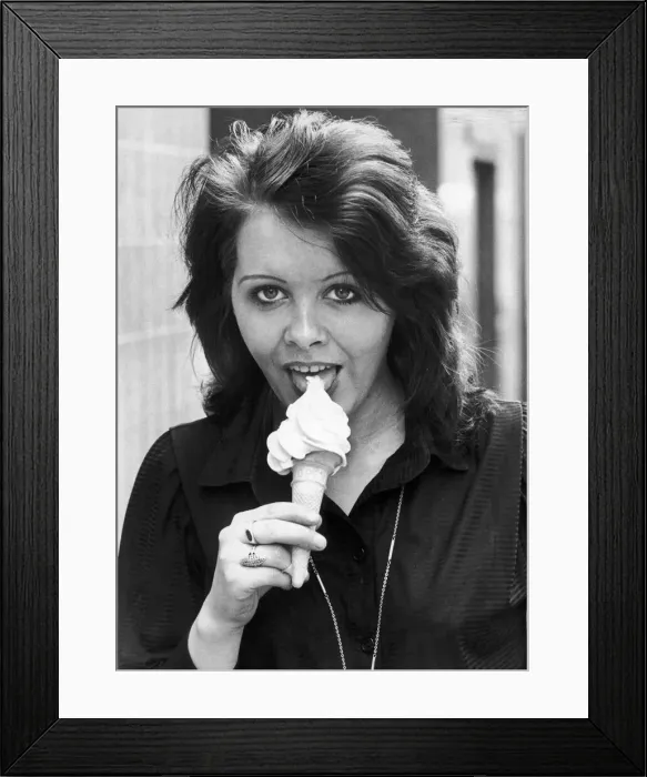 Framed Print : Anne Alexander gives a suggestive lick to a creamy ice cream cone. 15th May 1980 Framed Print : Anne Alexander gives a suggestive lick to a creamy ice cream cone. 15th May 1980