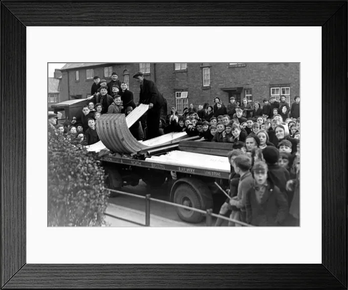 Framed Print : A crowd of excited youngsters watched the delivery of the first consignment of ARP air