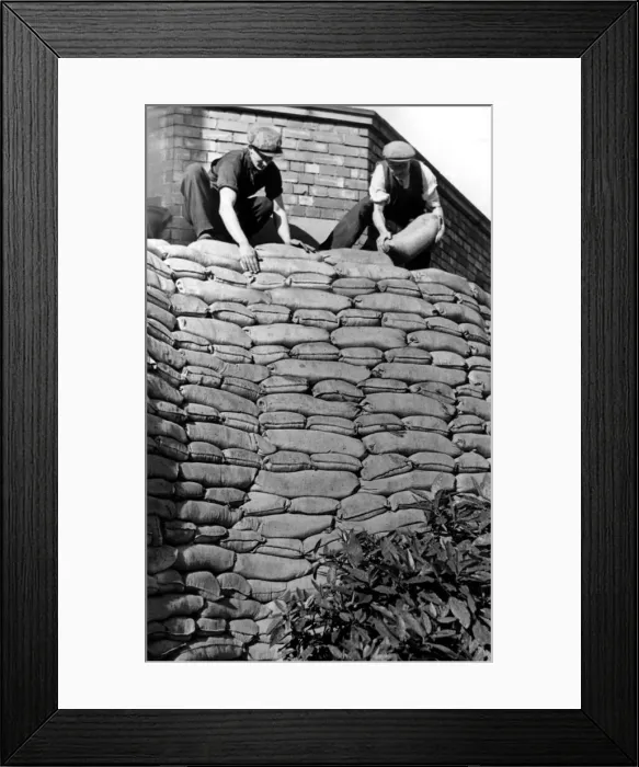 Framed Print : Sandbags are placed for the protection of vital buildings in Gateshead in prepartion for Framed Print : Sandbags are placed for the protection of vital buildings in Gateshead in prepartion for