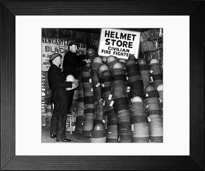 Framed Print : Storekeepers checking some of the 19, 000 new-type steel helmets which arrived in Framed Print : Storekeepers checking some of the 19, 000 new-type steel helmets which arrived in