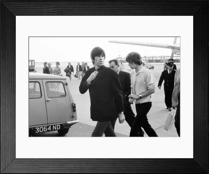 Framed Print : The Rolling Stones arrive at Manchester from London. l-r Keith Richards Framed Print : The Rolling Stones arrive at Manchester from London. l-r Keith Richards
