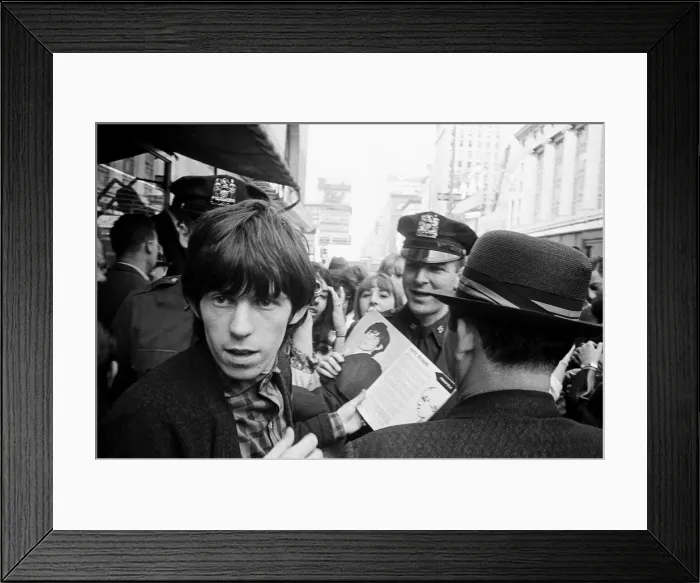 Framed Print : Keith Richards of The Rolling Stones signing autographs on Broadway. 2nd June 1964 Framed Print : Keith Richards of The Rolling Stones signing autographs on Broadway. 2nd June 1964