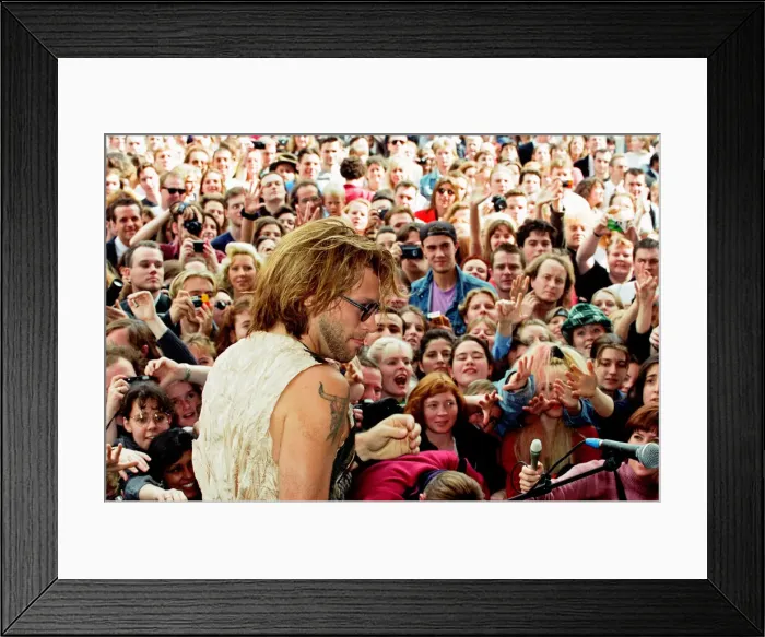 Framed Print : Jon Bon Jovi, lead singer of rock group Bon Jovi, busking in Covent Garden Framed Print : Jon Bon Jovi, lead singer of rock group Bon Jovi, busking in Covent Garden