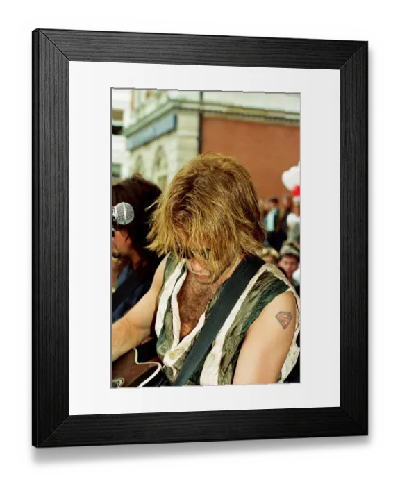 Framed Print : Jon Bon Jovi, lead singer of rock group Bon Jovi, busking in Covent Garden Framed Print : Jon Bon Jovi, lead singer of rock group Bon Jovi, busking in Covent Garden