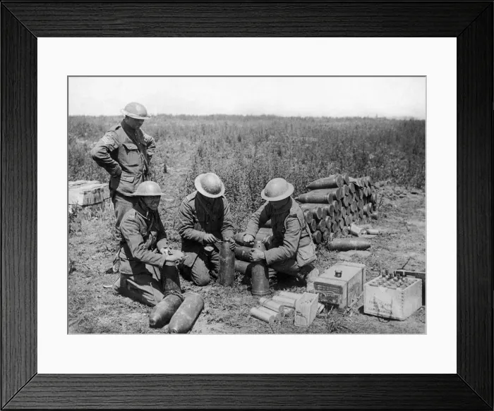 Framed Print : Artillerymen seen here setting the fuses for a bombardment of the German trenches