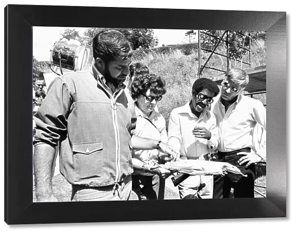 Director Jerry Lewis (left) seen here reading the script with Sammy Davis Junior