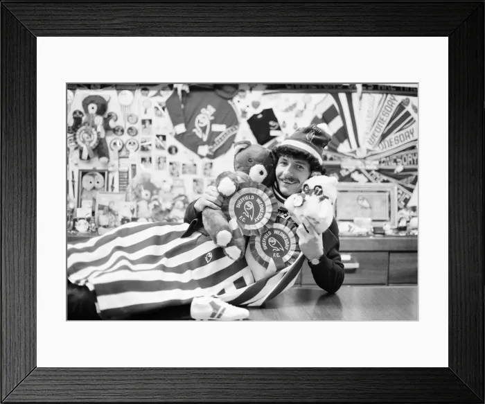 Framed Print : Sheffield Wednesday footballer Terry Curran decked out in the teams rosettes