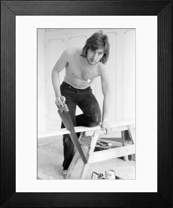 Framed Print : Chelsea footballer Alan Hudson tundertaking some DIY at his Putney home, May 1972 Framed Print : Chelsea footballer Alan Hudson tundertaking some DIY at his Putney home, May 1972