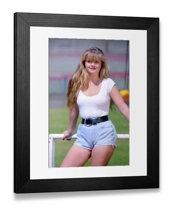 Framed Print : Eastenders actress Daniella Westbrook poses wearing aa white body top with denim shorts Framed Print : Eastenders actress Daniella Westbrook poses wearing aa white body top with denim shorts