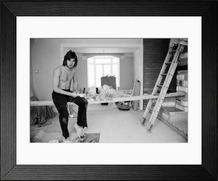 Framed Print : Chelsea footballer Alan Hudson takes a break from DIY at his Putney home, May 1972 Framed Print : Chelsea footballer Alan Hudson takes a break from DIY at his Putney home, May 1972
