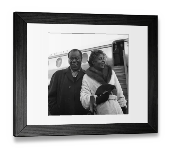 Framed Print : Louis Armstrong Pictured arriving at a London Airport with wife Lucille