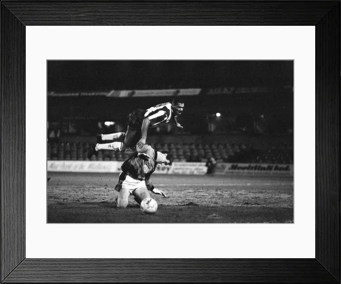 Framed Print : Don Goodman of West Bromwich Albion flies over Leicester City goalkeeper Hodge during Framed Print : Don Goodman of West Bromwich Albion flies over Leicester City goalkeeper Hodge during