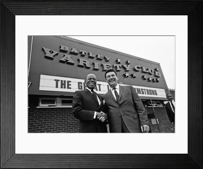 Framed Print : Louis Armstrong seen observing an old Batley tradition. Touching the Yorkshire Mills Framed Print : Louis Armstrong seen observing an old Batley tradition. Touching the Yorkshire Mills