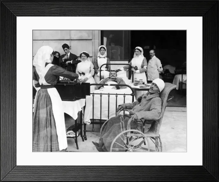 Framed Print : Nurses at an un-named hospital in France play a gramaphone to a few of the soldiers