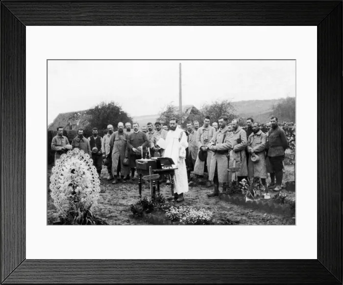 Framed Print : French soldiers hold a mass amongst the graves of their fallen comrades just behind