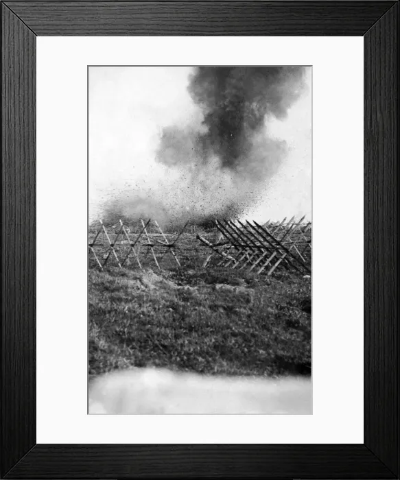 Framed Print : British artillery seen here bombarding the German wire on the Somme battlefield