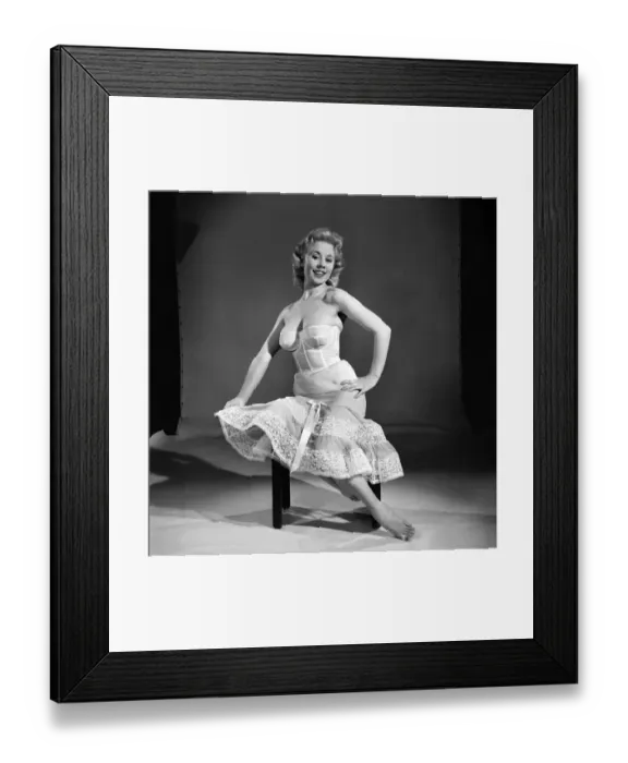 Framed Print : Clothing: Fashion: Underwear: Woman wearing corsett and petticoat. Model: Shane Condell