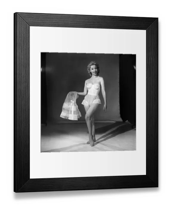 Framed Print : Clothing: Fashion: Underwear: Woman wearing corsett and petticoat. Model: Shane Condell