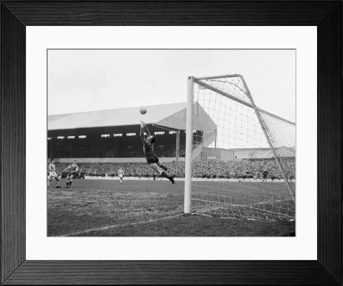 Framed Print : Rotherham United goalkeeper Ron Ironside makes a flying save during the match against