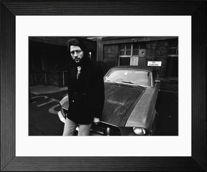 Framed Print : Huddersfield Town Frank Worthington with his Mustang car outside his team Framed Print : Huddersfield Town Frank Worthington with his Mustang car outside his team