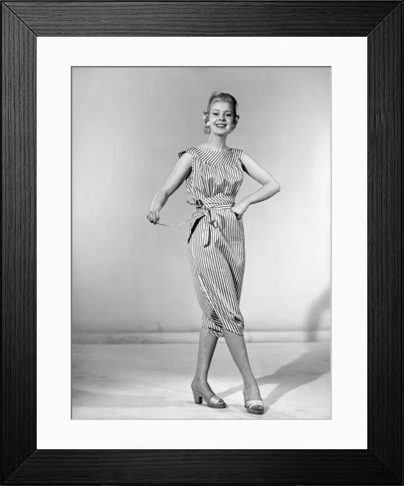 Framed Print : Clothing: Fashion: Dresses: Woman wearing reversible dress. 1957 B303-001