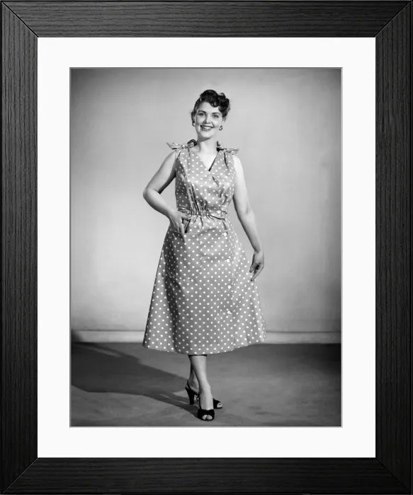 Framed Print : Clothing: Fashion: Beachwear: Woman wearing beach wrap and dress. Model: Audrey Hurst