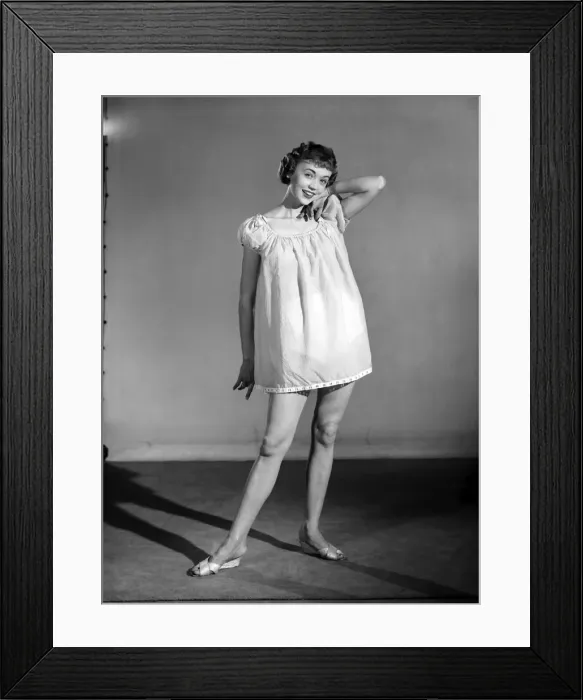 Framed Print : Clothing: Fashion: Nightwear: Woman wearing night dress. 1955 B409-002 Framed Print : Clothing: Fashion: Nightwear: Woman wearing night dress. 1955 B409-002