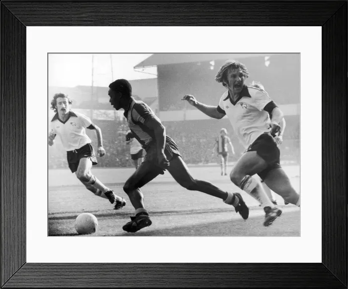 Framed Print : Laurie Cunningham of West Bromwich Albion, in action v Derby County, Colin Todd (right) Framed Print : Laurie Cunningham of West Bromwich Albion, in action v Derby County, Colin Todd (right)