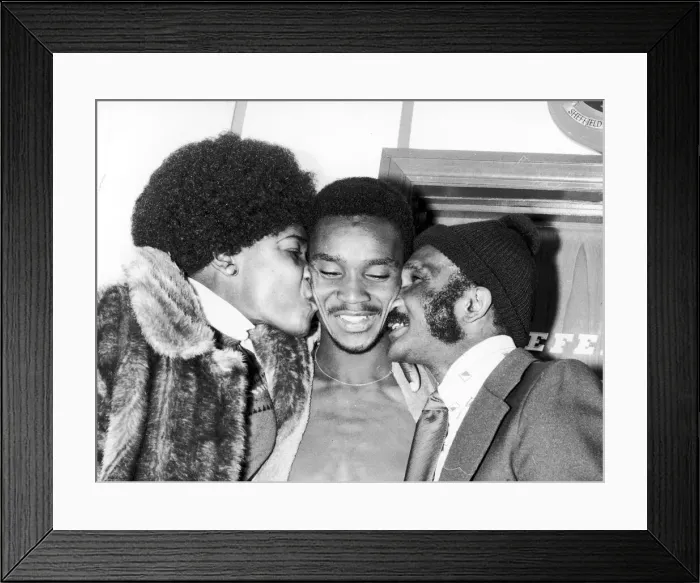 Framed Print : Laurie Cunningham pictured with parents, after successful debut in England 1-0 Framed Print : Laurie Cunningham pictured with parents, after successful debut in England 1-0