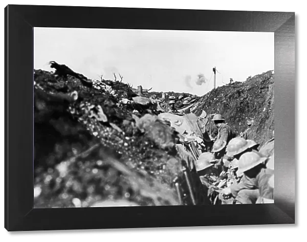 Shrapnel bursting over Canadian troops sheltering in a reserve trench during the The