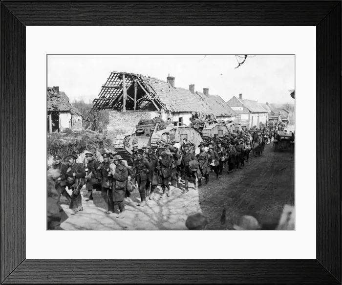 Framed Print : British troops passing tanks in a French village close to Amiens following the German