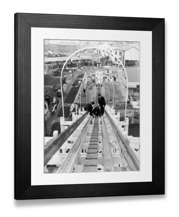 Framed Print : Workmen check over the new giant water chute built at Belle Vue Framed Print : Workmen check over the new giant water chute built at Belle Vue