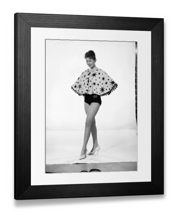 Framed Print : Clothing: Fashion: Capes: Woman wearing beach cape. Model: Maggie Duck. 1960 B1226-004