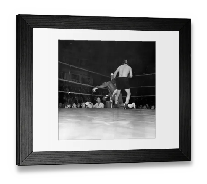 Framed Print : Muhammad Ali falls during his exhibition bout at the Royal Albert Hall London England Framed Print : Muhammad Ali falls during his exhibition bout at the Royal Albert Hall London England