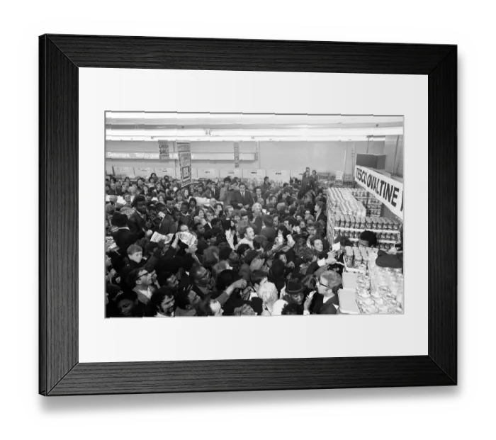 Framed Print : Muhammad Ali at a supermarket in Stretford to promote Ovaltine cornered by loads of fans