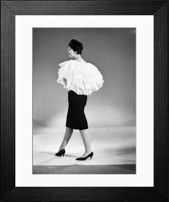 Framed Print : Clothing: Fashion: Capes: Woman wearing frilly cape that can be adapted to become a skirt Framed Print : Clothing: Fashion: Capes: Woman wearing frilly cape that can be adapted to become a skirt