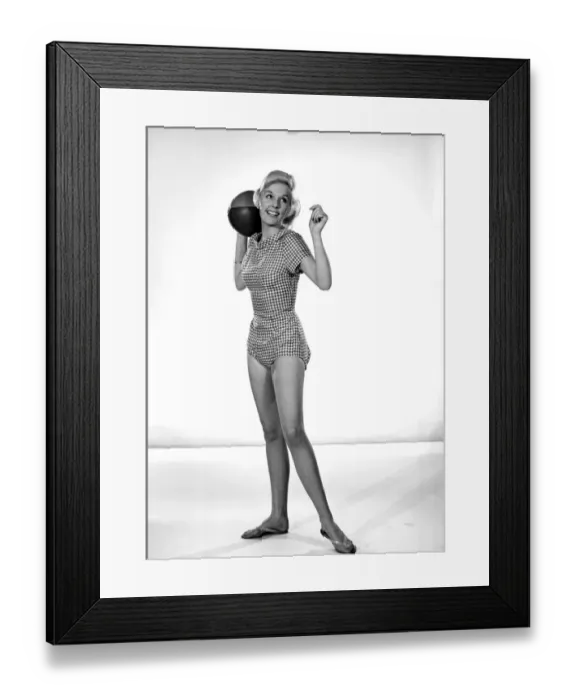 Framed Print : Clothing: Fashion: Beachwear: Woman wearing check swimming costume