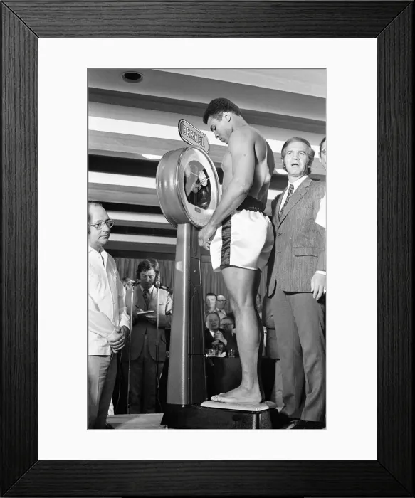 Framed Print : Muhammad Ali on the scales prior to his fight with Alvin Lewis, aka Blue Lewis Framed Print : Muhammad Ali on the scales prior to his fight with Alvin Lewis, aka Blue Lewis