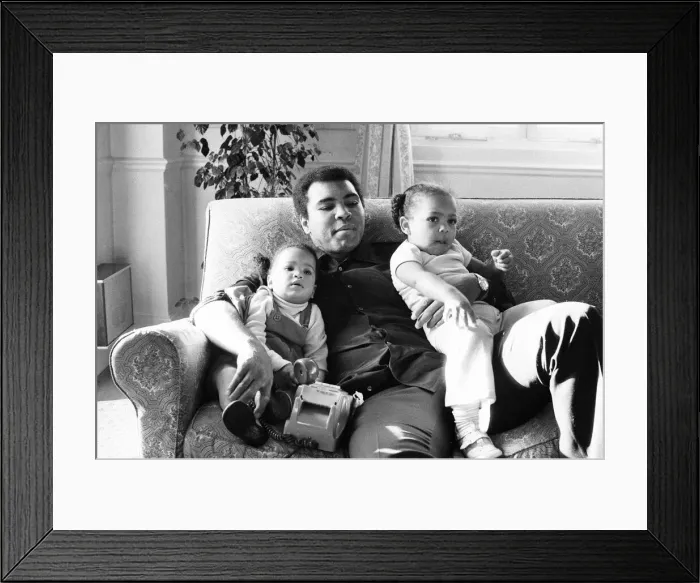 Framed Print : Muhammad Ali plays doting father in a London Hotel to daughters Laya Framed Print : Muhammad Ali plays doting father in a London Hotel to daughters Laya