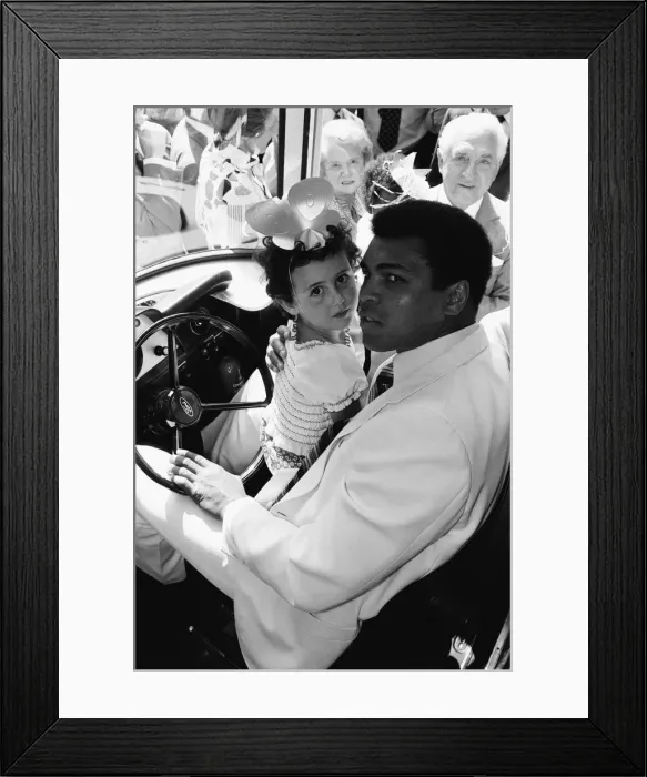 Framed Print : World Heavy-weight boxing champion, Muhammad Ali presented a coach on behalf of Framed Print : World Heavy-weight boxing champion, Muhammad Ali presented a coach on behalf of