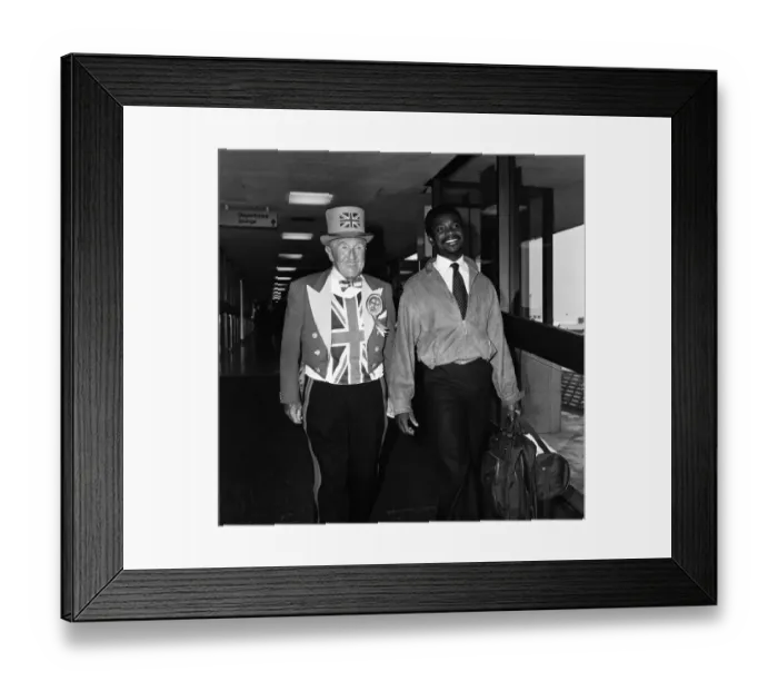 Framed Print : Laurie Cunningham at Heathrow Airport London, prior to flying out to Bucharest via Munich Framed Print : Laurie Cunningham at Heathrow Airport London, prior to flying out to Bucharest via Munich