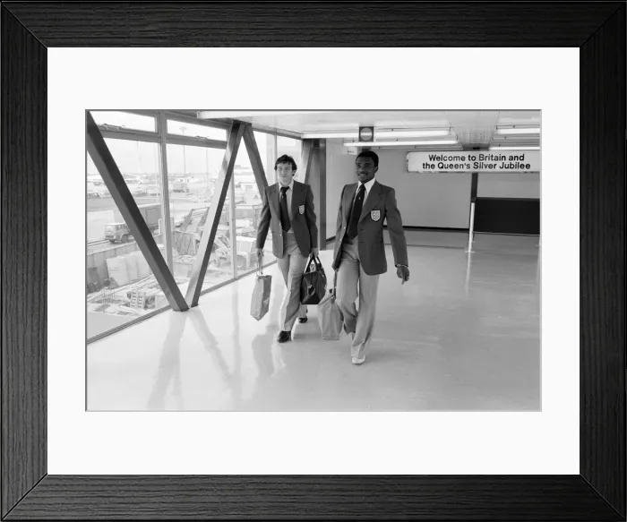 Framed Print : England U21 Laurie Cunningham and team mate leaving Heathrow Airport for Helsinki Framed Print : England U21 Laurie Cunningham and team mate leaving Heathrow Airport for Helsinki