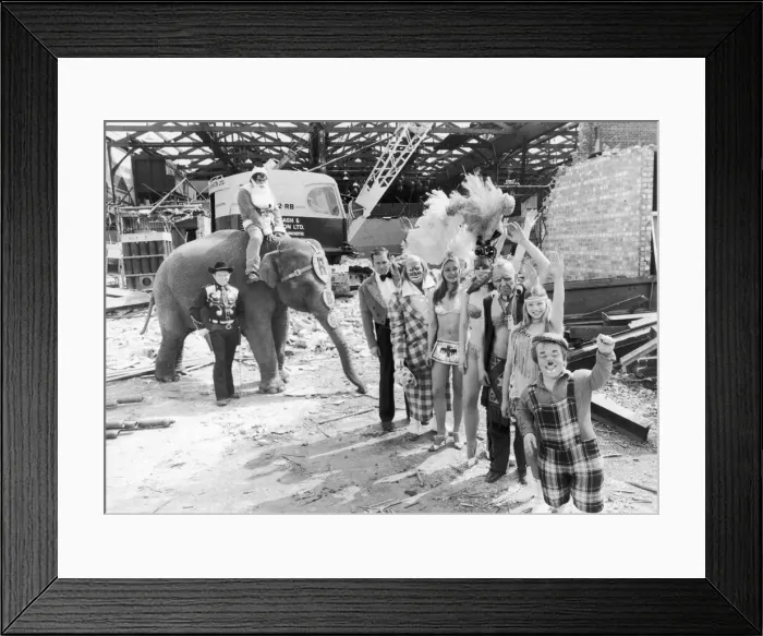 Framed Print : Acts from Belle Vues famous circus outside the partially demolished Kings Hall Framed Print : Acts from Belle Vues famous circus outside the partially demolished Kings Hall