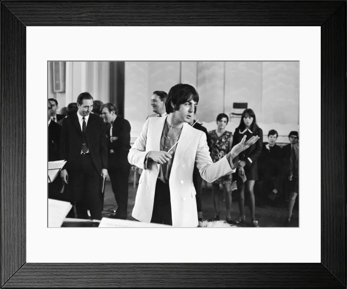 Framed Print : Paul McCartney of The Beatles, conducts the Black Dyke Mills Band, recording a record Framed Print : Paul McCartney of The Beatles, conducts the Black Dyke Mills Band, recording a record