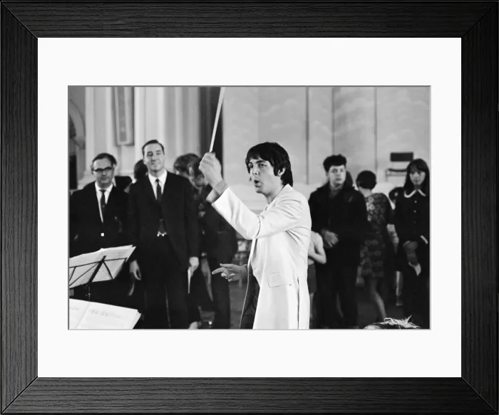 Framed Print : Paul McCartney of The Beatles, conducts the Black Dyke Mills Band, recording a record Framed Print : Paul McCartney of The Beatles, conducts the Black Dyke Mills Band, recording a record